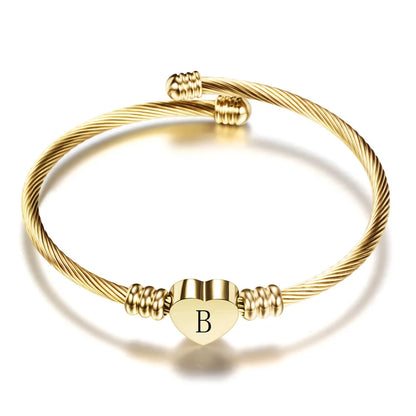 Bracelet manchette en acier inoxydable avec lettre initiale
